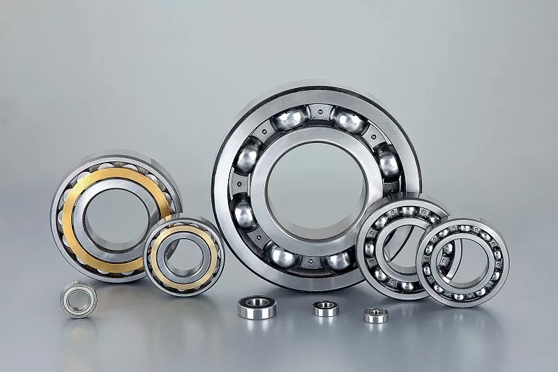 What are the effects of preload and rotational speed on bearing stiffness